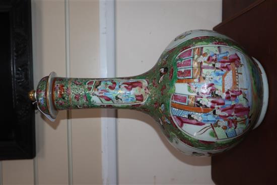 A large Chinese famille rose bottled vase and cover, mid 19th century (restored) height 46cm